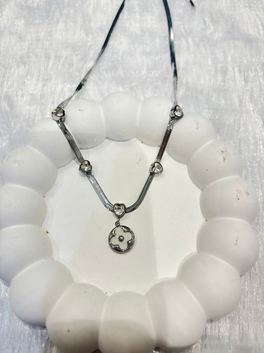 Silver Clover Pendant Necklace with Heart Accents