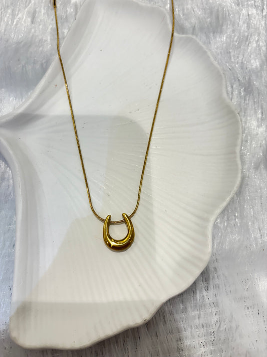 Gold crescent pendant necklace